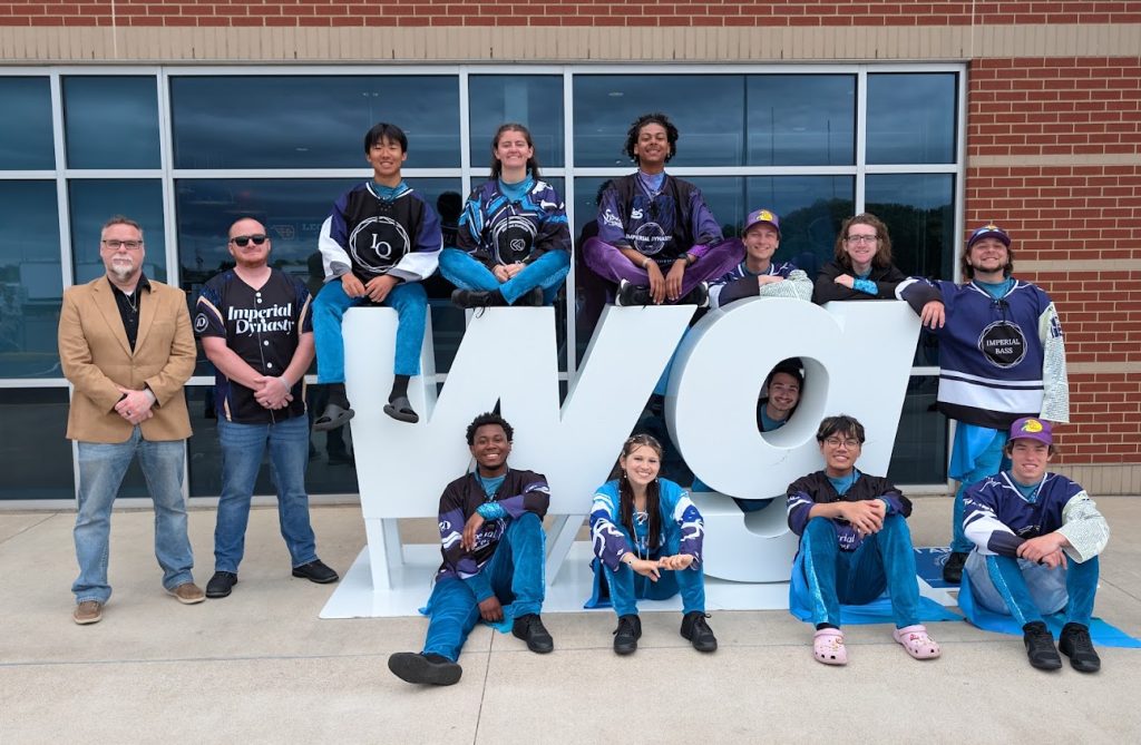 Rob Wiltbank with some of the Imperial Dynasty crew at WGI Finals.